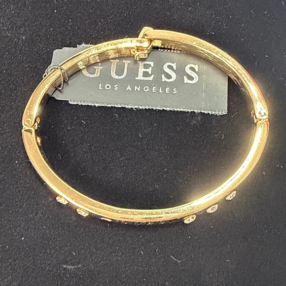 GUESS Gold and Silver Heart Earrings and bracelet set - Picture 6 of 7